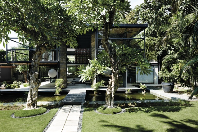 The scale and proportions of the villa set amongst a manicured Zen garden make a strong first impression.
