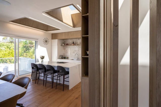 In the kitchen skylights, the shafts feature the same timber as the kitchen cabinetry and they’ve been embossed with a 10mm negative detailing around the edge and recessed perimeter lighting.