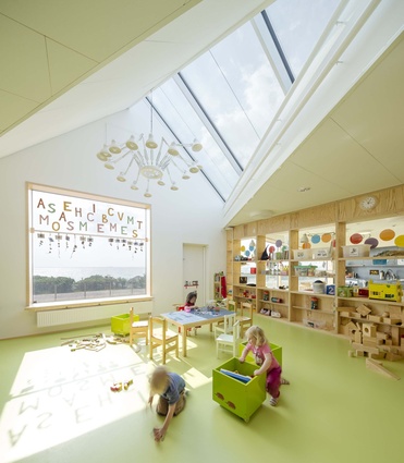 Råå Day Care Center. Large windows in the facade and the roof create a connection with the sea, and allow for plenty of natural daylight into all the playrooms.