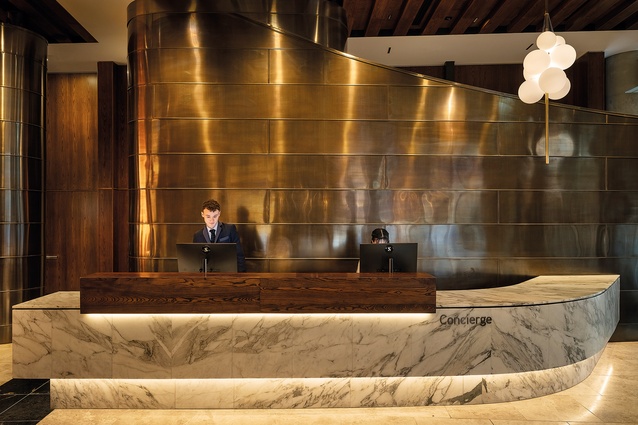 The reception area has a finely curved marble counter.