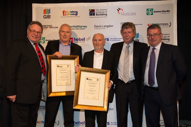 Paul Youngman and Ted Senner receive are presented with the Davis Langdon Over $50m Award for the Christchurch International Airport Integrated Terminal project.
