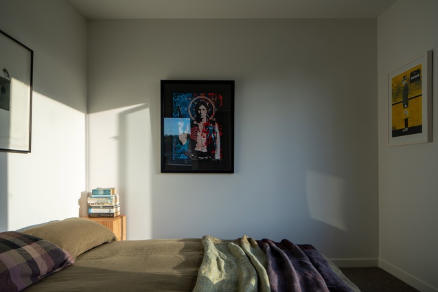The two bedrooms have built-in wardrobes and share a compact bathroom. 