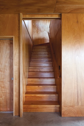 The stairs leading up to the master bedroom.