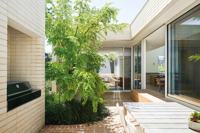 The courtyard that gives the house its name acts as a centralized lung to ventilate the house.