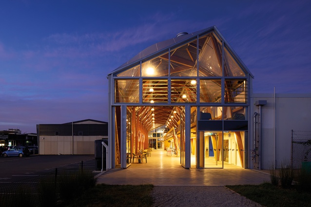Early morning light exposes the fine timber arcade, starting from Te Awarua-o-Porirua and looking south, straight towards Pātaka Art + Museum.