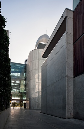 On three sides the theatre features a simple exterior cladding of timber and glass.