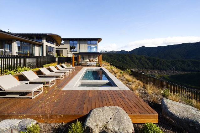 A heated outdoor pool soaks in the view of the valley.
