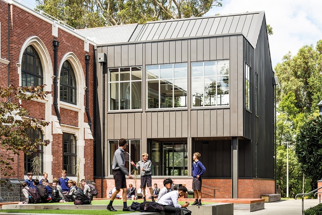 The eastern quad is viewed from the north. Although the addition’s materials and fenestration pattern are contemporary, its form and massing respect that of the earlier building.