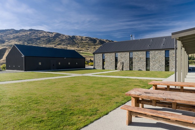Cardrona distillery in the Cardrona Valley, New Zealand. The design comprises three buildings of simple form placed around a central courtyard, each housing a distinct part of the spirit-making process.