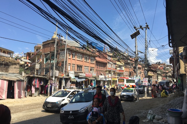 An aerial vista of spaghetti electricity lines that line the road network of Kathmandu.