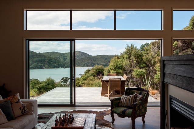 Nestled into the bush and overlooking an 1880s-era house, this contemporary Kawau Island home marks the start of a new phase of occupation for the area. 