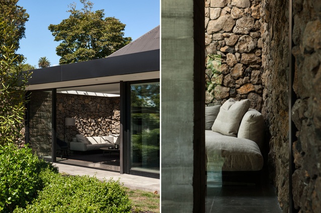 Volcanic stones from the site were used to create a feature wall that runs throughout this Mount Eden home. 