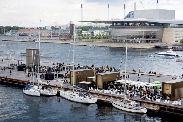 Kvæsthusmolen’s urban upgrade around Copenhagen’s Royal Danish Playhouse incorporates small pavilions containing cafés, ticket offices, restrooms and a stage tower. 

