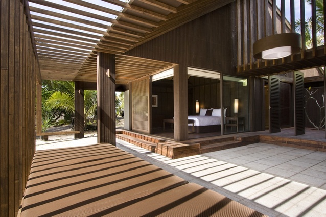 Vomo Island Villa, Fiji. Completed in 2008. Timber shutters, screens and sliding glass doors are used to broaden the functionality and aesthetic complexity of the walled spaces.