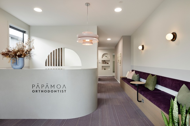 The practice’s reception area offers a sophisticated, calm space for patients.
