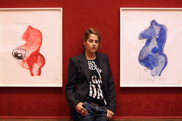 Tracey Emin between artworks in her exhibition, Do Not Abandon Me.