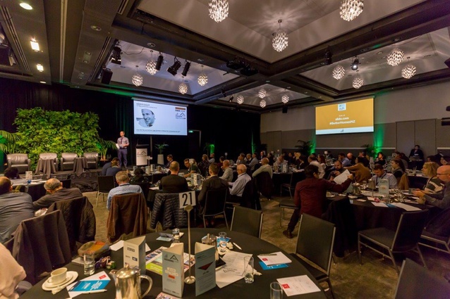 Andrew Eagles, chief executive officer of the New Zealand Green Building Council (NZGBC) welcomes guests to the Housing Summit on 20 June in Auckland. 