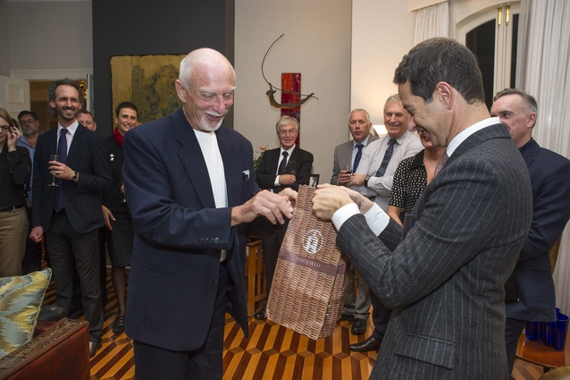Tony van Raat presents a bottle of Amisfield wine to His Excellency Carmelo Barbarello – Ambassador of Italy.
