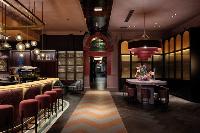Material Creative designed the Eunice Taylor tiered, tassel pendant and the Bisazza-tiled buffet table, made by Gartshore. Textured Luke Jacomb pendants light the bar area, with Harrows stools upholstered in plum and currant hues.