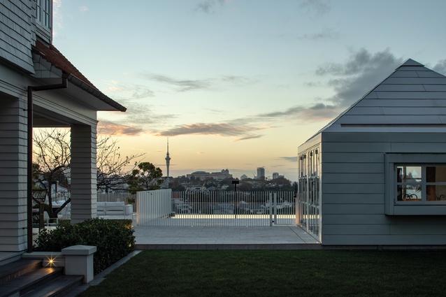 The home and pool house soak in views of Auckland city.
