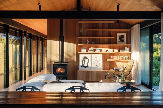 The living area, with the hallway/gallery at left an western deck at right.