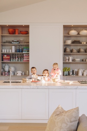 Jack, Annabelle and Lily enjoy some sweet
treats in the kitchen.