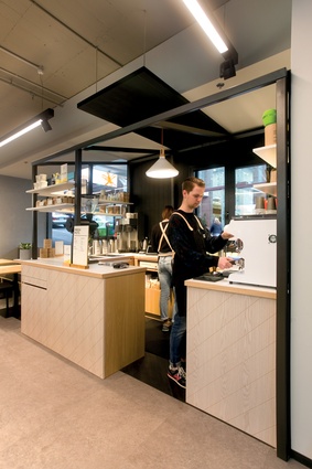 A larger floor area meant Spaceworks was able to incorporate a café into the design of the Queen Street store.