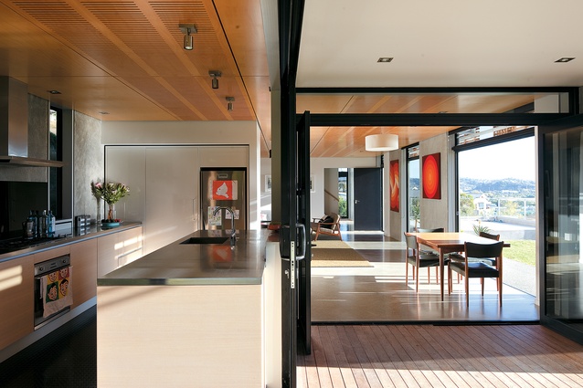 Looking from the outdoor living through to the kitchen and dining space. 
