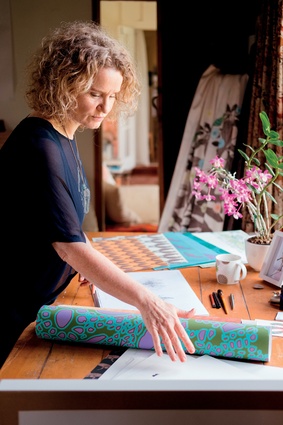 Miranda Brown at work in her West Auckland home and studio.
