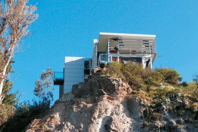 A cliff top home is still awaiting demolition after two years.