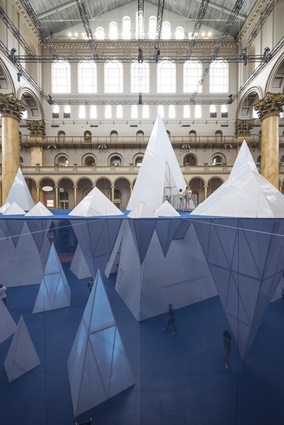 ICEBERGS. The Great Hall has been transformed into a literal representation of a 3D ice cube drawing, with the large polycarbonate icebergs creating texture and movement.