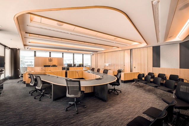 Effort was put into making court proceedings feel more collaborative, using curved tables and seating arrangements. Also, all courtrooms have views to the outdoors.