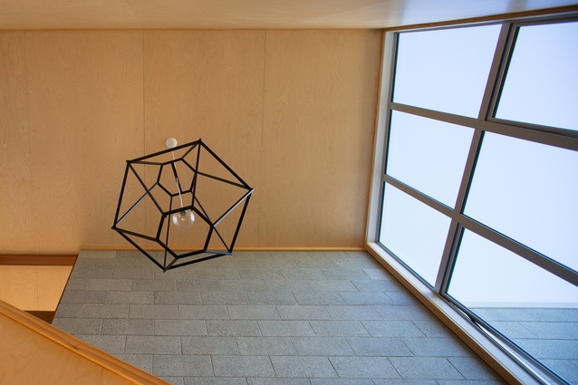Cutting shapes in the stairwell at Langs Beach House. Completed 2015.