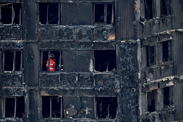 Emergency workers and police inspect inside the remains of Grenfell Tower. Peter Vanezis, a professor of forensic medical sciences at Queen Mary University in London, described it as “an inferno.”