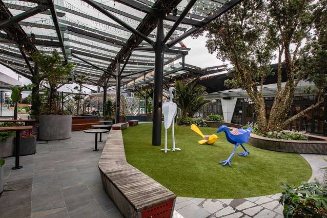 Seating and greenery are positioned outside restaurants and eateries to create a revitalising hub for socialising, rest and play.