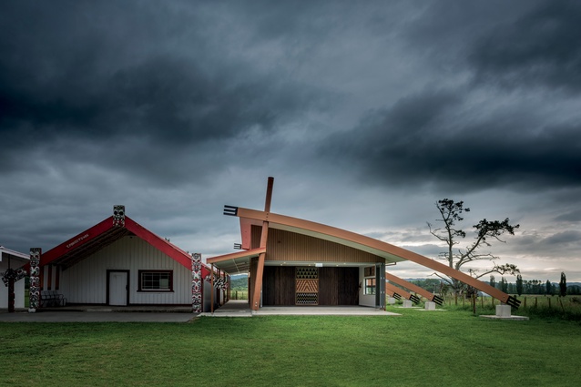The old and new, Tanatana Marae’s new wharemate on the right overlooks a sacred atea to the front, and at the rear is a stunning view of Te Uruwera forest. 