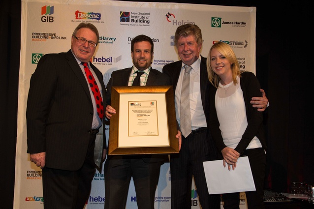 Progressive Building Young Achiever Award winner Andrew Rowden is presented with his award.