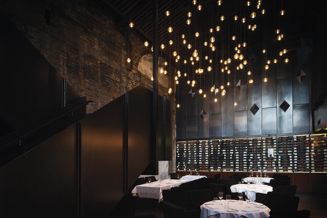 The Roxy – a fine-dining experience under Bocci spherical lighting in the second of the building’s old cinemas. The stair provides access to the restaurant’s mezzanine.