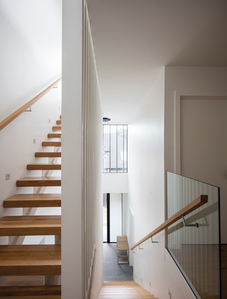 St Heliers House. The stairwell covers three stories and features vertical screening.
