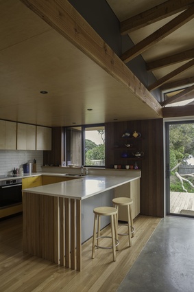 Pitoitoi House kitchen, which showcases some of the crafted timber elements that feature throughout the home.