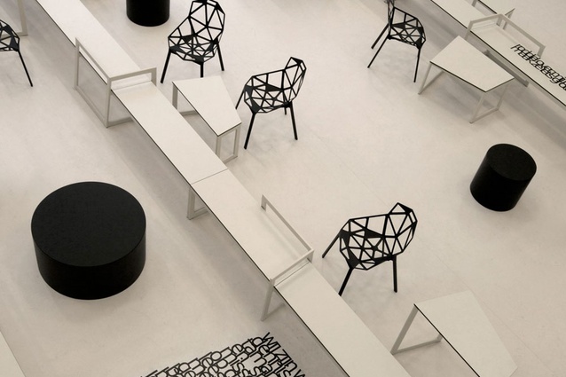 The designers say Konstantin Grcic's Magis One chair was chosen because it matches the "technical aura" – urges students to think about the design and production process. The furniture is made to measure; the tables are designed in asymmetrical, angular shapes, which allow them to be linked in square, circular or star-shaped configurations.