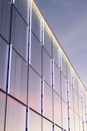 TheLighthouse is clad in a curtainwall façade, disguising the limited number of actual windows on an otherwise ‘blank’ wall.