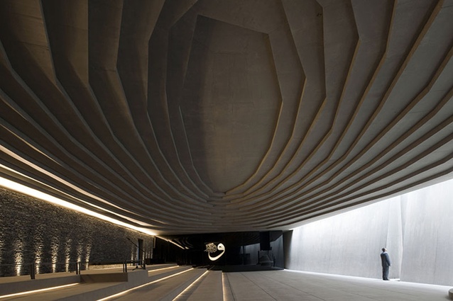 Sancaklar Mosque, Turkey by Emre Arolat Architects. Built in 2012, the interior is designed as a simple yet dramatic cave-like space to encourage peaceful contemplation.