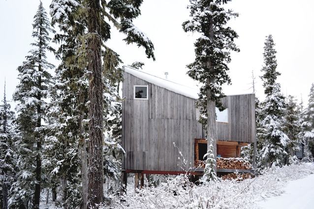 An exterior view of the wooden cabin designed and made by Scott & Scott Architects.