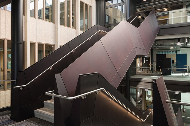 Sculptural stairs criss-cross the atrium between council offices.