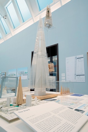 Installational view showing models, drawings and information about the design of The Shard, London.