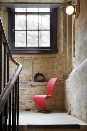The S chair makes a statement in the stairwell.