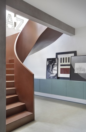 One of the apartment’s most poignant moments is at the stair’s landing where the sculptural meets traditional Moorish, meets industrial and contemporary.