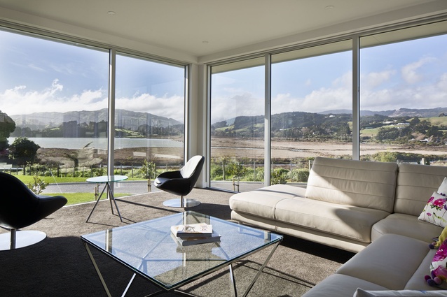 Floor-to-ceiling glazing brings the view to the fore in this house by Simon Novak. 
