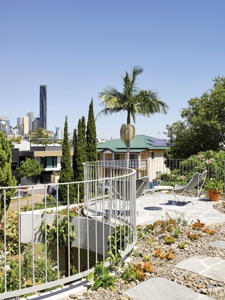 A monolith green roof holds the house's disparate parts together and provides city views.